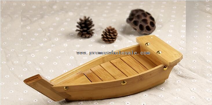 Bamboo ship shaped wooden serving sushi tray