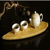 Liści herbaty, obsługujących taca w kształcie images