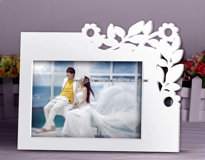 White carved wooden photo frame