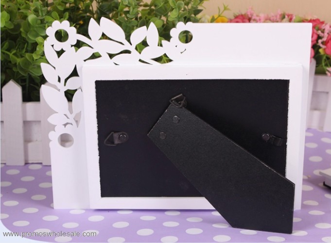 White carved wooden photo frame