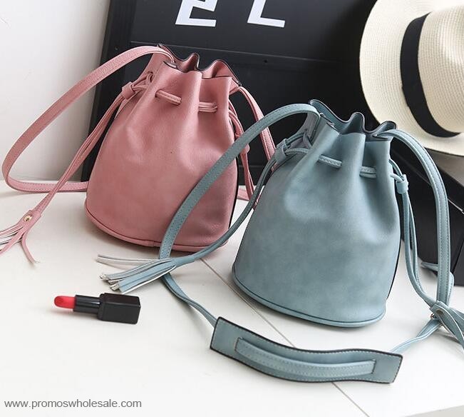 leather tassel draw string travel bag 
